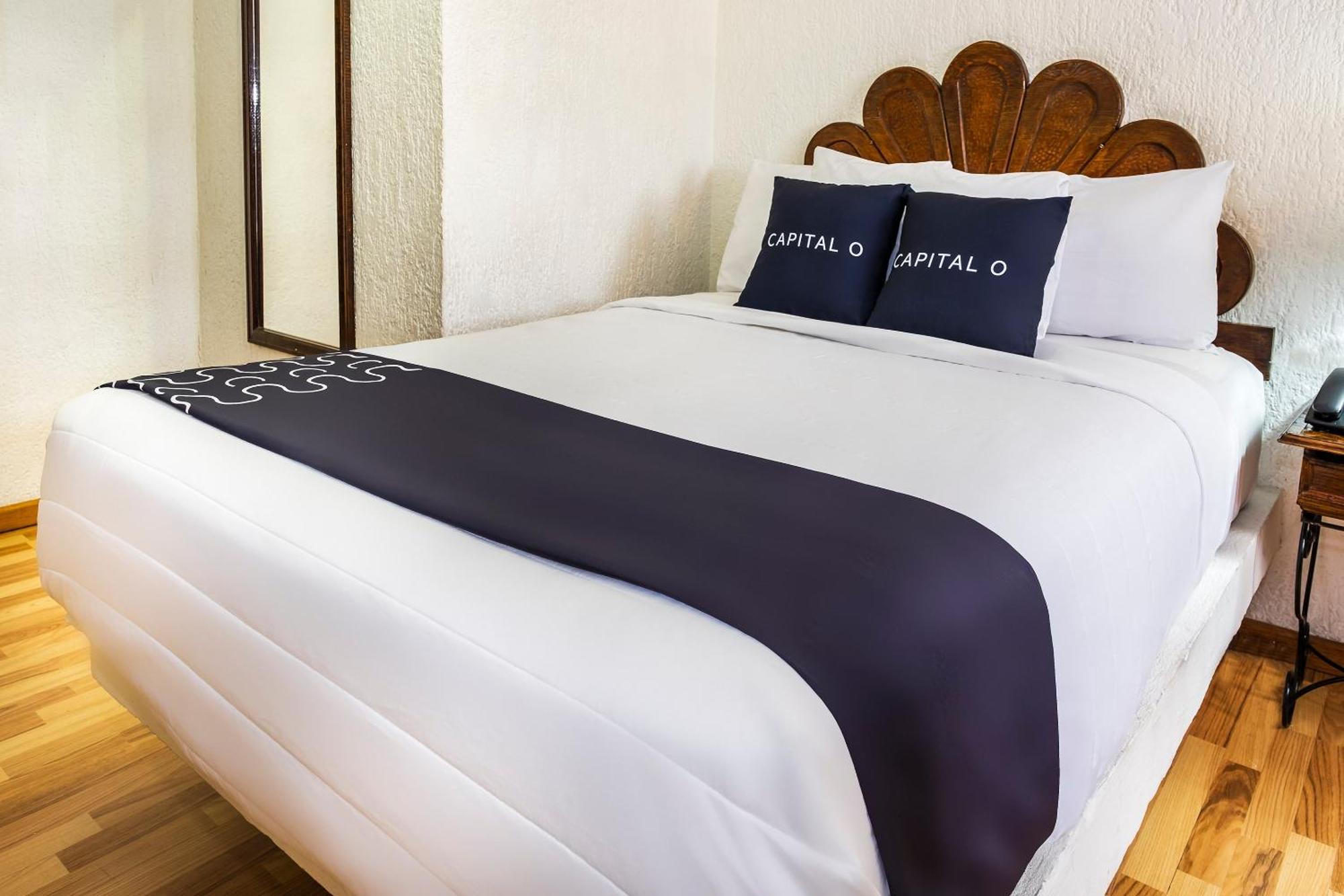 Capital O Hotel Central, ハラパ エクステリア 写真