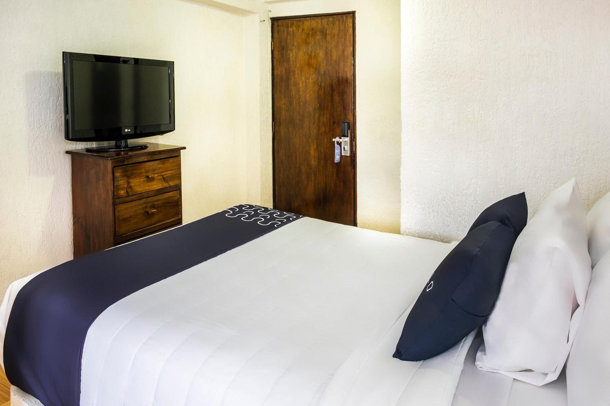 Capital O Hotel Central, ハラパ エクステリア 写真